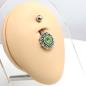 Preview: Steel Bauchnabelpiercing im blumigen Brass Design