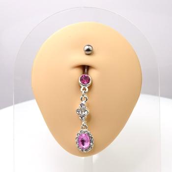 Bauchnabelpiercing mit pinkem Kristall