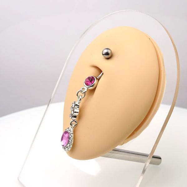 Bauchnabelpiercing mit pinkem Kristall