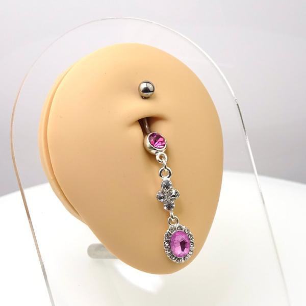Bauchnabelpiercing mit pinkem Kristall